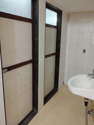 Bathroom in 1 BHK Apartment at Panchamrut CHS Thane, Ghodbunder Road – for Rent