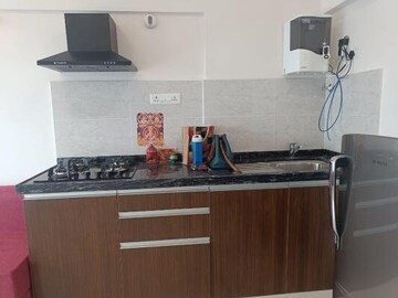 Kitchen in Studio Apartment at Gera World of Joy, Kharadi – for Rent