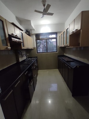 Kitchen in 2 BHK Apartment at Vijay Vilas Taurus Building 11 To 15, Ghodbunder Road – for Rent