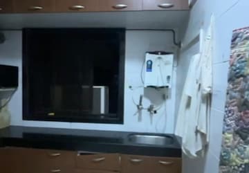 Kitchen in 2 BHK Apartment at Evershine Grandeur, Malad West – for Rent