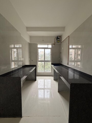 Kitchen in 2 BHK Apartment at Bhatia Esspee Towers, Borivali East – for Sale