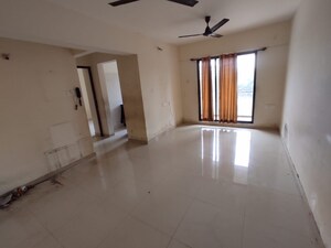 Room in 2 BHK Apartment at Vistas CHS, Kavesar – for Rent