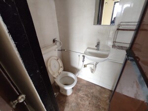 Bathroom in 2 BHK Apartment at Vistas CHS, Kavesar – for Rent