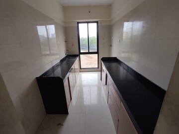 Kitchen in 2 BHK Apartment at Vistas CHS, Kavesar – for Rent