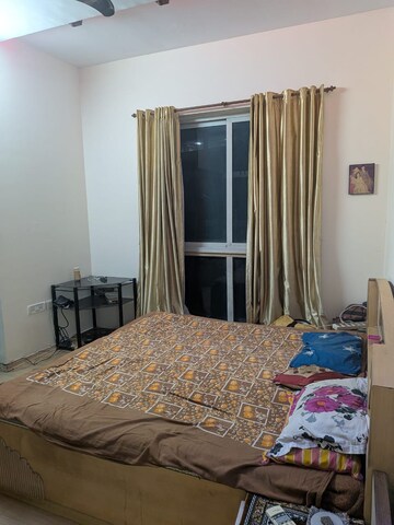 Bedroom in 2 BHK Apartment at Sheth Vasant Lawns, Laxmi Nagar – for Rent