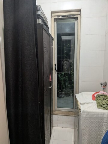 Building Lobby in 2 BHK Apartment at Sheth Vasant Lawns, Laxmi Nagar – for Rent