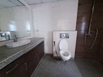 Bathroom in 3 BHK Apartment at Raheja Vedaanta, Sector 108 – for Sale