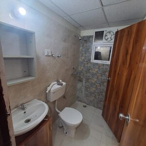 Bathroom in 2 BHK Apartment at Signature Global The Millennia, Garoli Kalan – for Rent