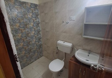 Bathroom in 2 BHK Apartment at Signature Global The Millennia, Garoli Kalan – for Rent