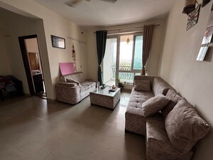 Living Room in 2 BHK Apartment at Mahagun Moderne, Sector 78 – for Sale