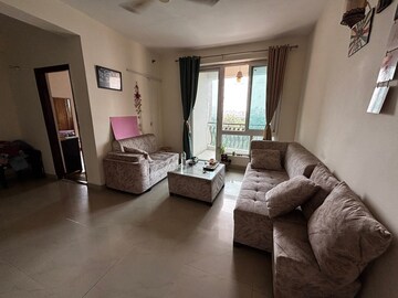 Living Room in 2 BHK Apartment at Mahagun Moderne, Sector 78 – for Sale