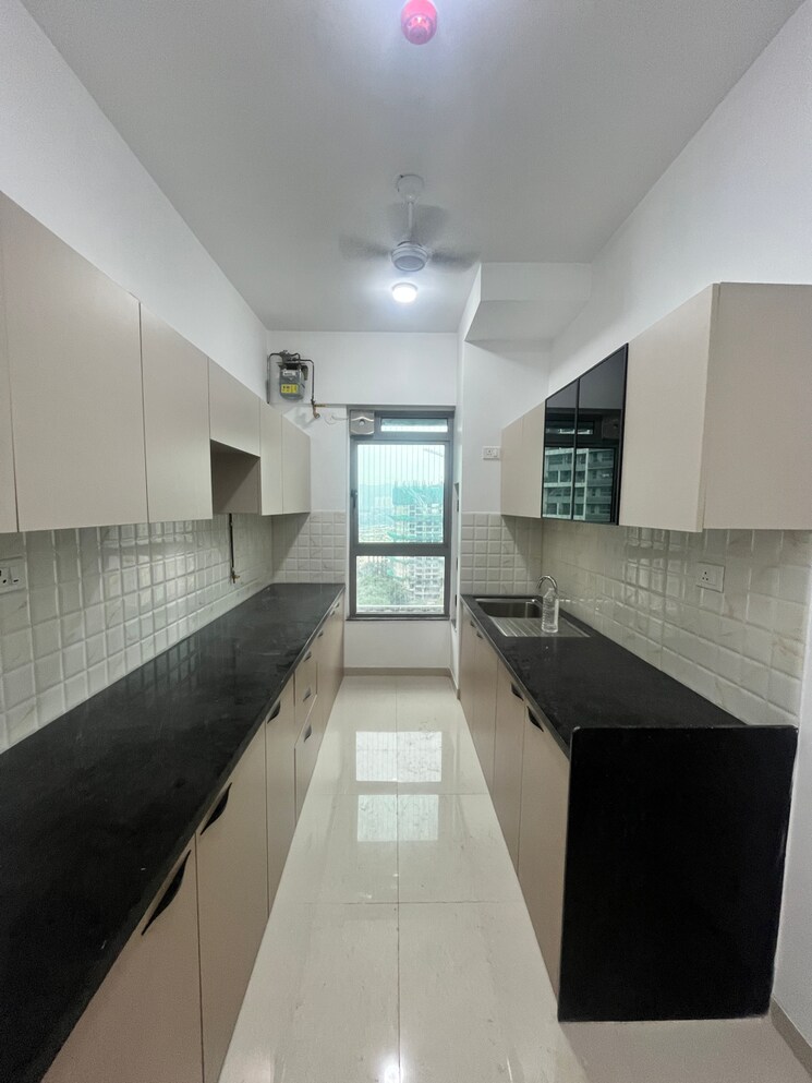 Kitchen, kalpataru-immensa-e 2 Bedroom 598 Sq.Ft. Apartment In Kolshet Industrial Area Thane 9374989