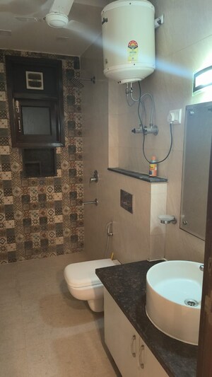 Bathroom in 3 BHK Builder Floor at Chittaranjan Park – for Sale