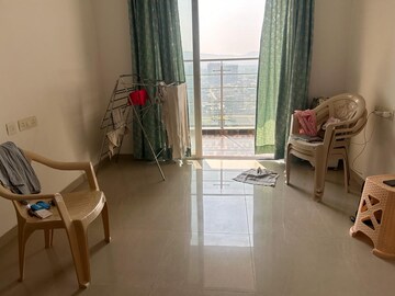 Living Room in 1 BHK Apartment at Kolte Patil R1 Life Republic, Hinjewadi – for Rent
