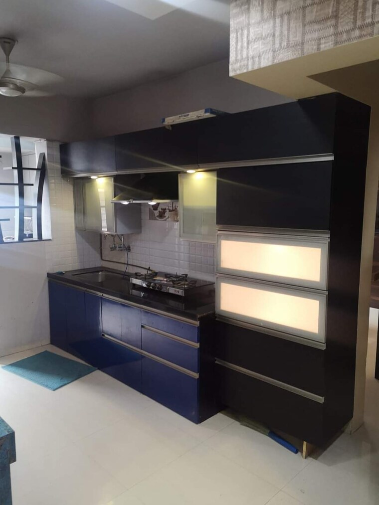 Kitchen, blue-berry 3 Bedroom 1200 Sq.Ft. Apartment In Kharadi Pune 9375081