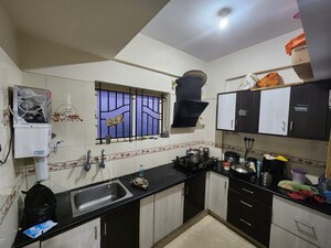 Kitchen in 2 BHK Apartment at Raja Rajeshwari Nagar – for Sale