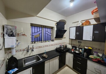 Kitchen in 2 BHK Apartment at Raja Rajeshwari Nagar – for Sale