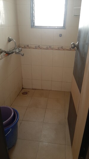 Bathroom in 1 BHK Apartment at Mantri Park, Goregaon East – for Rent