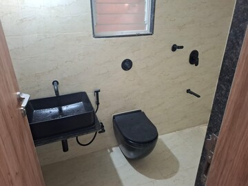 Bathroom in 2.5 BHK Apartment at Unique K Town, Kiwale – for Rent