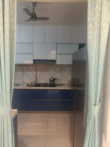 Kitchen in 2 BHK Apartment at Pride World City, Charholi Budruk – for Rent