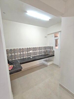 Kitchen in 2 BHK Apartment at Signature The Millennia 3, Sector 37d – for Rent