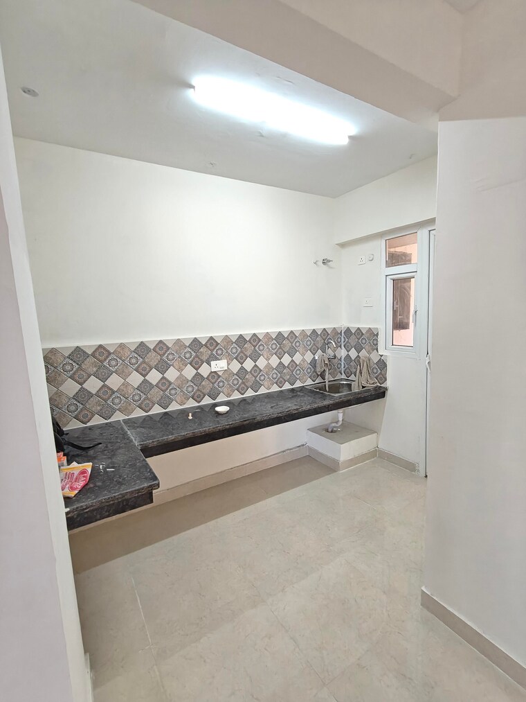 Kitchen, signature-the-millennia-3 2 Bedroom 661 Sq.Ft. Apartment In Sector 37d Gurgaon 9375109