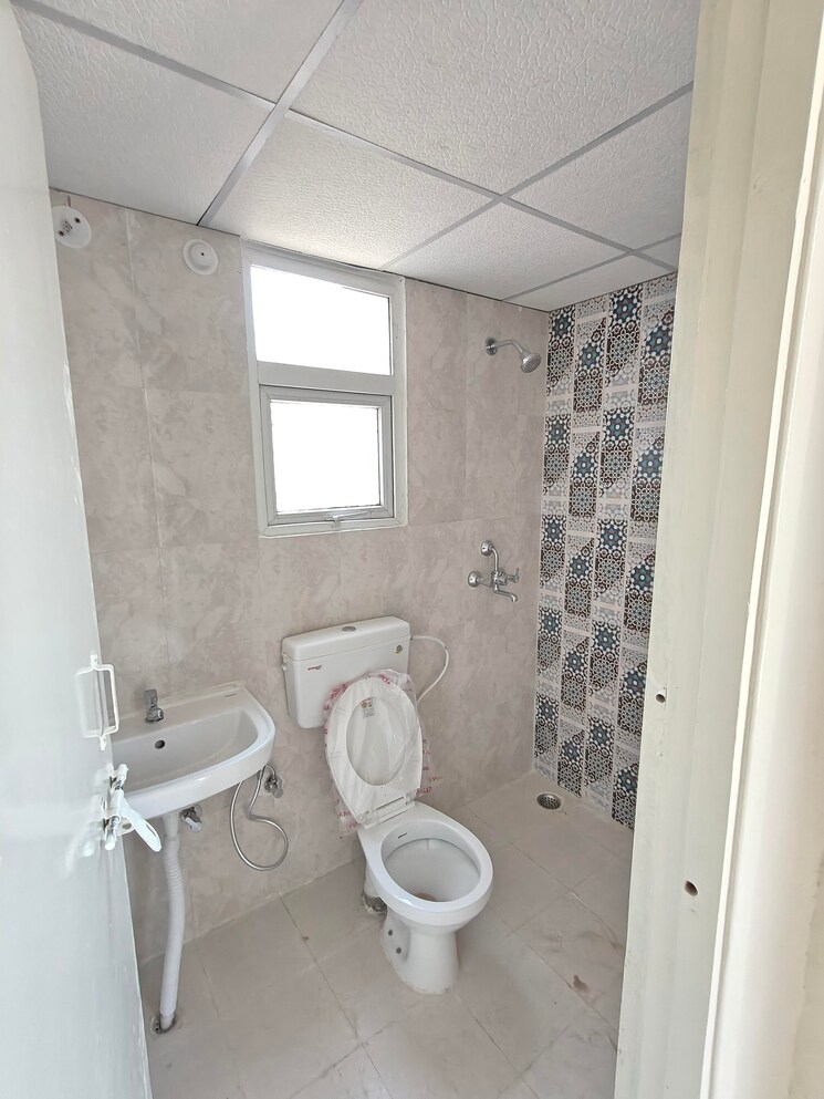 Bathroom, signature-the-millennia-3 2 Bedroom 661 Sq.Ft. Apartment In Sector 37d Gurgaon 9375109