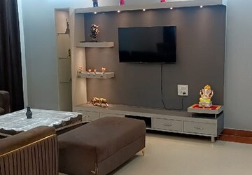 Living Room in 2 BHK Apartment at Artique Uptown Skylla, International Airport Road – for Rent