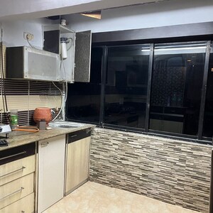 Kitchen in 2 BHK Apartment at Accord CHS Andheri West, Lokhandwala Complex – for Rent