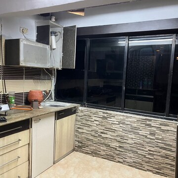 Kitchen in 2 BHK Apartment at Accord CHS Andheri West, Lokhandwala Complex – for Rent