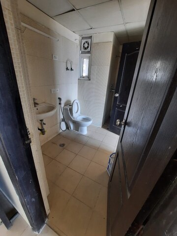 Bathroom in 1 BHK Apartment at Aditya Celebrity Homes, Sector 76 – for Rent