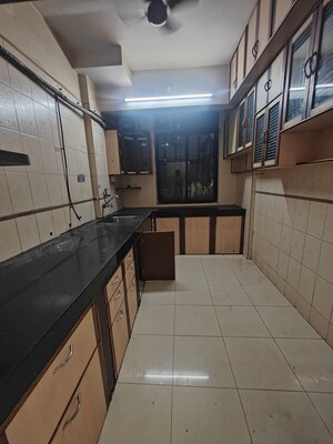 Kitchen in 2 BHK Apartment at Mahavir Vihar CHS, Nerul – for Rent