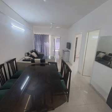 Living Room in 2 BHK Apartment at Signature Global The Millennia, Garoli Kalan – for Rent