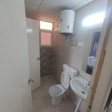 Bathroom in 2 BHK Apartment at Signature Global The Millennia, Garoli Kalan – for Rent