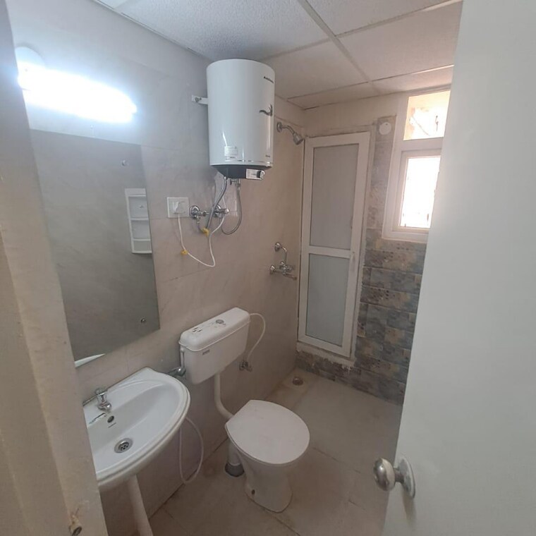 Bathroom, signature-global-the-millennia 2 Bedroom 644 Sq.Ft. Apartment In Garoli Kalan Gurgaon 9375279