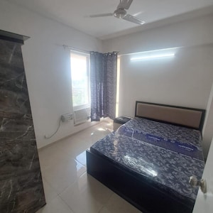 Bedroom in 2 BHK Apartment at Signature Global The Millennia, Garoli Kalan – for Rent