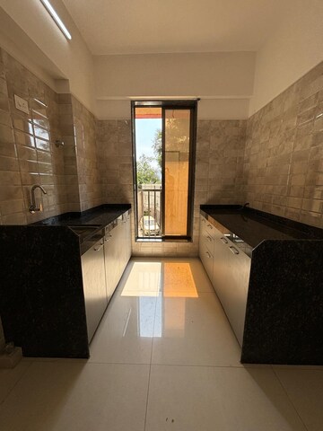 Kitchen in 1 BHK Apartment at Neminath Hiloni Heights, Vasai East – for Sale