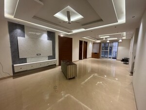 Living Room in 4 BHK Apartment at Chattarpur – for Sale