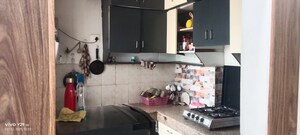 Kitchen in 2 BHK Apartment at Mahagun Mahagunpuram, Shastri Nagar – for Sale