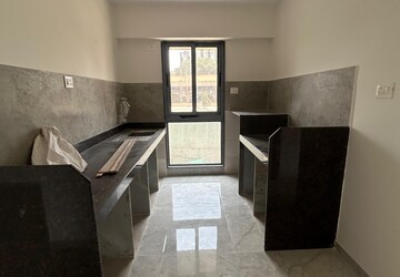 Team Area in 1 BHK Apartment at Ajmera Boulevard, Malad West – for Sale