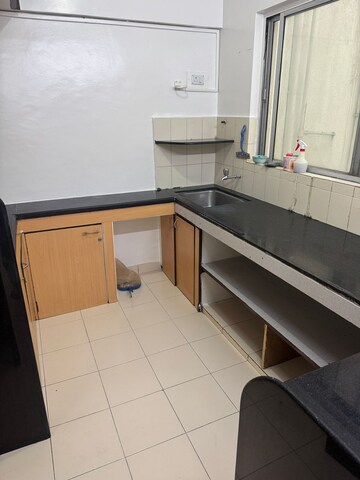 Kitchen in 2 BHK Apartment at Atur Park, Koregaon – for Rent