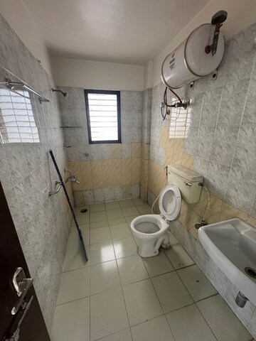 Bathroom in 2 BHK Apartment at Atur Park, Koregaon – for Rent