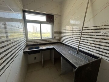 Kitchen in 1 BHK Apartment at Coral Heights, Kavesar – for Rent