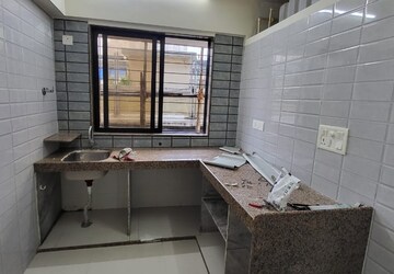 Kitchen in 1 BHK Apartment at Rajkamal Heights, Parel – for Rent