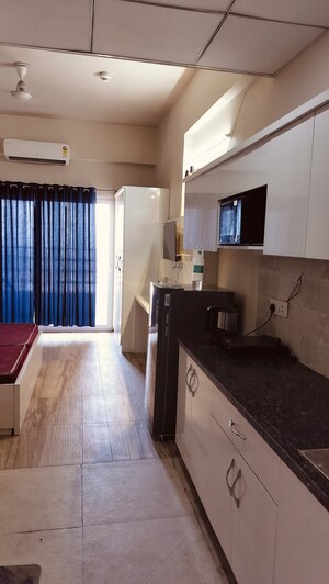 Kitchen in 1 BHK Apartment at Paramount Golfforeste, Zeta I Greater Noida – for Rent