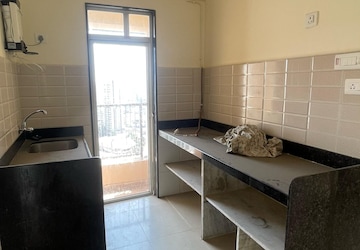 Kitchen in 2 BHK Apartment at JP North Imperia, Mira Road – for Rent