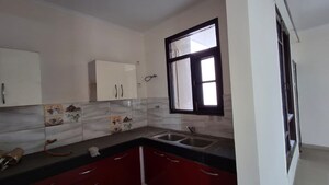 Kitchen in 3 BHK Apartment at Artique Uptown Skylla, International Airport Road – for Rent