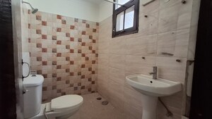 Bathroom in 3 BHK Apartment at Artique Uptown Skylla, International Airport Road – for Rent