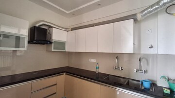 Kitchen in 3 BHK Apartment at Artique Uptown Skylla, International Airport Road – for Rent