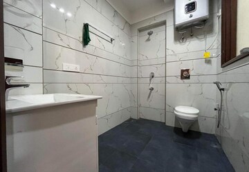 Bathroom in 2 BHK Builder Floor at Rajpur Khurd Extension – for Sale